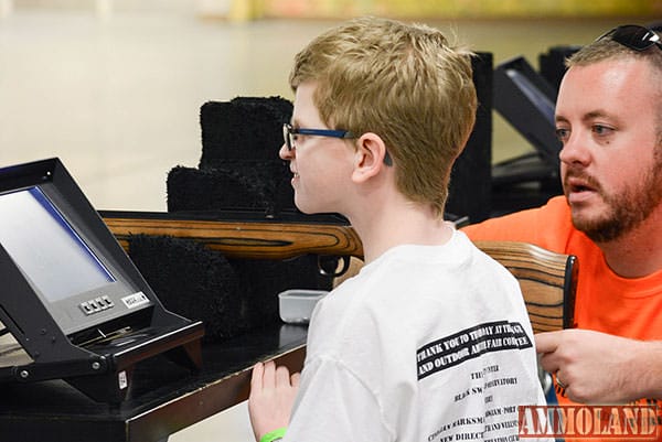 Benny Calcutta, 11, returned to shoot at the range for the second year. He was assisted by Brad Donoho of the CMP.