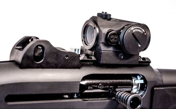 Addition of a red dot optic like this Aimpoint Micro allows fast and precise shooting.