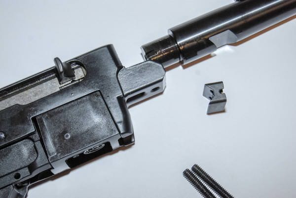 The Ruger 10 22 Rifle barrel is mounted with this v-block and two screws.