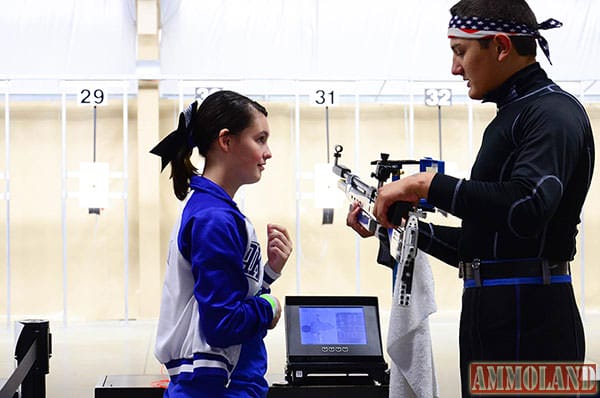 Tyler Thompson of the Ottawa County 4-H Shooting Stars air rifle team taught the students a little about the world of competitive shooting. Here, he shows Hannah Polanco of Danbury how to hold the rifle.