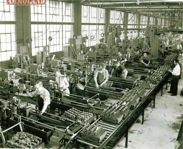 Workers assemble Garand M1 rifles in the Springfield Armory's Building 104.