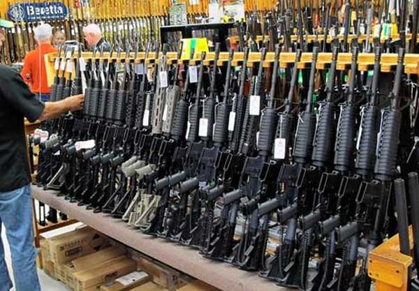 Racks of new Modern Sporting Rifles. The AR 15 Rifle is well on its way to be America's most popular rifle ever.