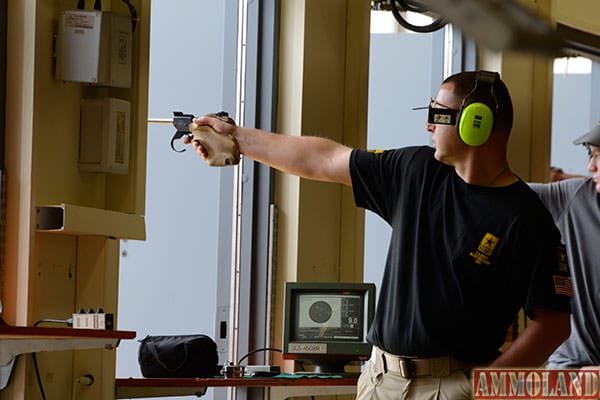 Staff Sgt. Greg Markowski, U.S. Army Marksmanship Unit, fires downrange in the 50-meter pistol event during the 2015 International Shooting Sport Federation Fort Benning World Cup for Rifle/Pistol May 18-24. Markowski qualified at the 2015 Winter Airgun Championships Dec. 3-6 in Colorado Springs, Colorado, to compete in the final Olympic Trials in June for airgun. (Photo by Sgt. 1st Class Raymond J. Piper)