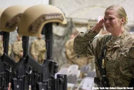 Service members from several units at Bagram Airfield, Afghanistan pay their respects during a Dec. 23 fallen comrade ceremony held in honor of six airmen who lost their lives in an improvised explosive attack near Bagram on Dec. 21 2015. (Photo: Tech. Sgt. Robert Cloys/Air Force)