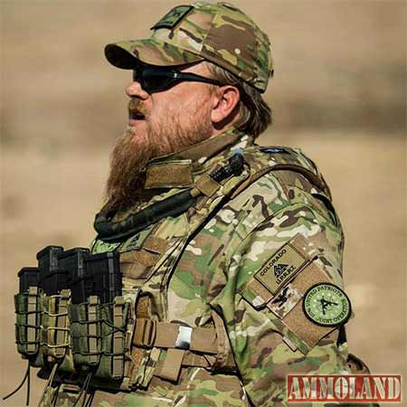 Mike Morris wears camouflage, a load-bearing vest and magazines during a Three Percent United Patriots training day in February. (Photo: Mike Morris)