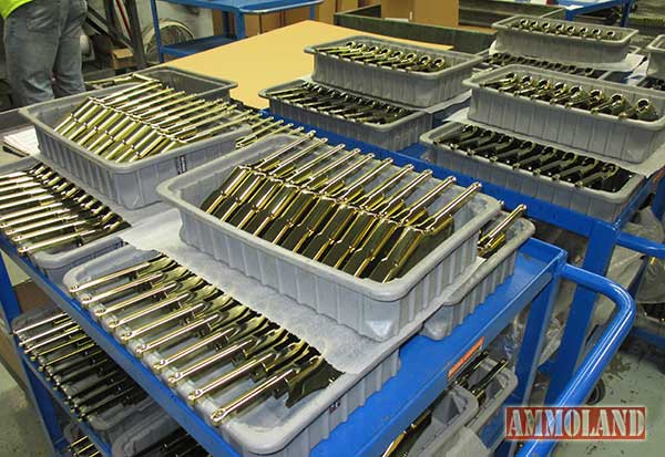 Newly manufactured rifle receivers waiting their turn to become Henry Wisconsin made Henry rifles.