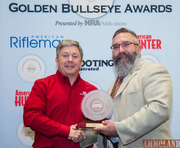 Savage Arms President Al Kasper (left) accepting the award for 2016 Rifle of the Year from American Hunter Editor Scott Olmsted (right).