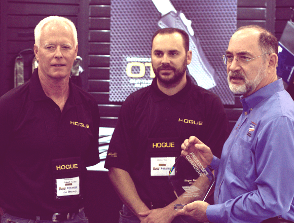 Knife Rights Chairman Doug Ritter (right) presents Jim Bruhns (left) and Neil Hogue with Knife Rights' 2016 Freedom's Guardian Award at BLADE Show in Atlanta, Georgia
