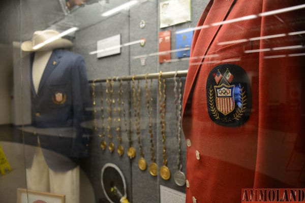 The Gary Anderson CMP Competition Center houses display cases filled with items from the astounding career of Gary Anderson – a two-time Olympic gold medalist. Among the many items are outfits worn by Anderson at the 1964 and 1968 Olympics, the Olympic torch he carried and handed to Muhammad Ali to light the main torch at the 1996 Games and the