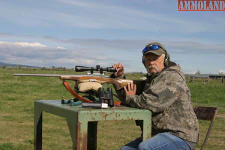 Author with new 6,5 Creedmoor / Ruger Hawkeye, on the bench in a dog town when testing both binoculars and scope systems.