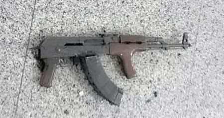 Turkey Terrorists AK Rifle : An AK-47 can be seen lying abandoned on the floor, after three suicide bombers set off blasts at the airport as police opened fire.