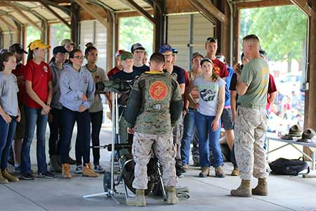 Members of the USMC shooting team provided classroom instruction and also conducted live firing practice on the range.
