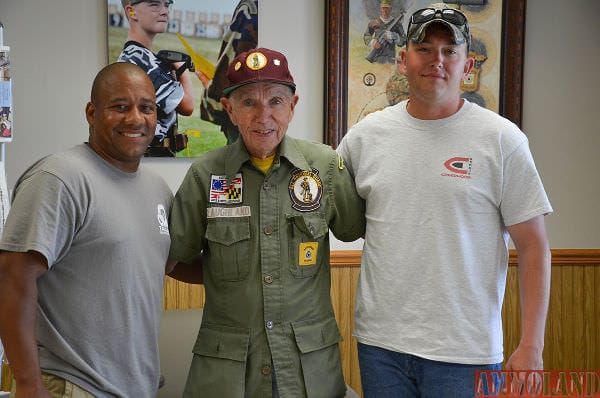 GySgt Luis Maceira (left) and M16 Match winner SSgt Josh Heckman (right) asked Jim for his autograph after spotting him in the CMP Headquarters office. Of course, Jim obliged.