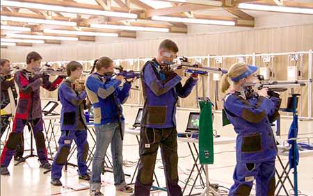 Ginny (far right) attended two CMP Rifle Camps where she not only excelled, but learned of the  potential for air rifle competition -- collegiate competition and the Olympics.