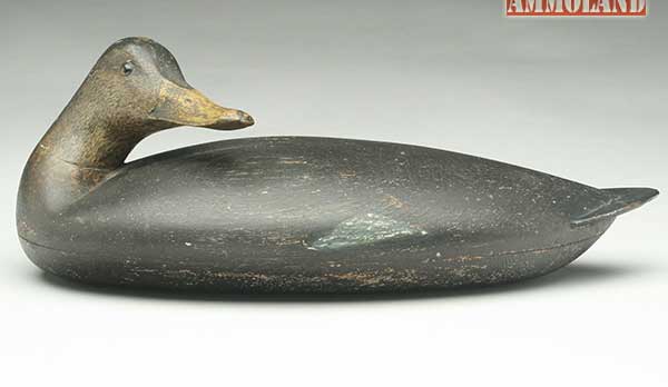 A preening black duck in original paint, circa 1850, by Albert Laing from the Dr. Lloyd Griffith collection sold well over its ($50,000 - $70,000) estimate at $97,750.