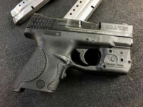 The new Crimson Trace Laserguard Pro pistol laser & light on a Smith & Wesson M&P Shield.