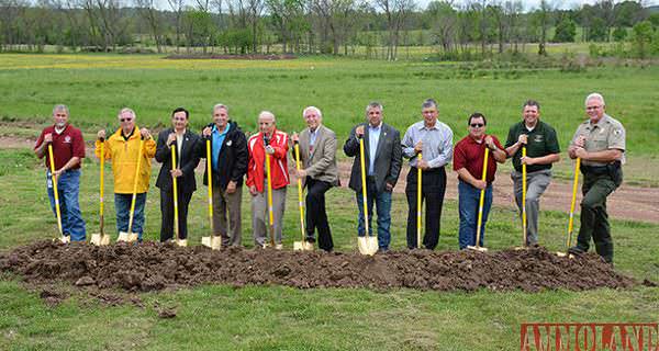 (L to R): Cherokee Nation Director of Planning and Development David Moore, Executive Director of Management Resources Bruce Davis, Secretary of State Chuck Hoskin Jr., Deputy Principal Chief S. Joe Crittenden, World Archery Champion Joe Thornton, Principal Chief Bill John Baker, Tribal Councilor Rex Jordan, Deputy Executive Director of Education Services Ron Etheridge, archery program coordinator Brian Jackson, Oklahoma Department of Wildlife Education Supervisor Colin Berg and Cherokee County Game Warden Brady May.