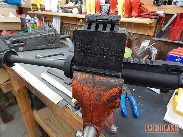 Figure 11: The AR-15 upper receiver clamped into the Brownells AR15 action block, and inserted into a vise.