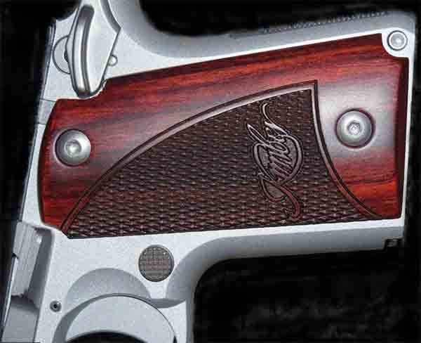 The Kimber Micro 9 Pistol's Checkered Rosewood Grip git my hand great & Looked good. The Kimber Micro 9 Pistol's Checkered Rosewood Grip git my hand great & Looked good.