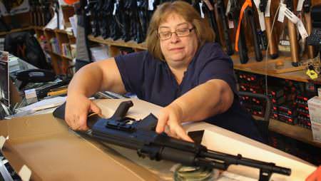 Gun Shop Owner with Machine Gun