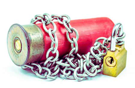 Shotgun Shell Lock Ban Arms Trade Treaty iStock Lalith_Herath 181495178