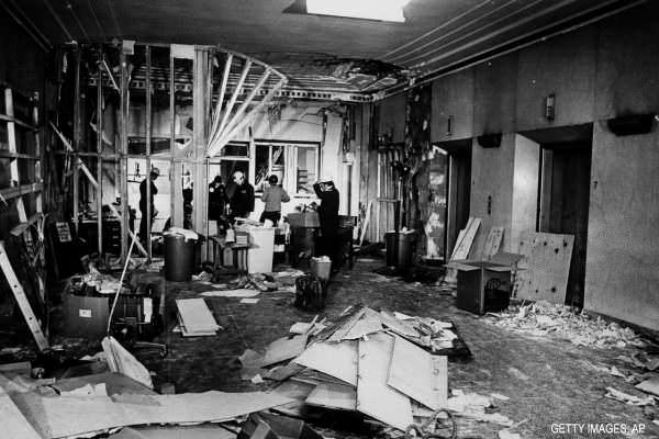 Investigators search the probation office of the Suffolk County Courthouse in Boston, Mass., after a bombing by the United Freedom Front, a small Marxist group, April 22, 1976.