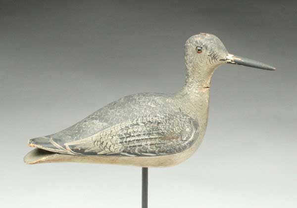 Top lot of the Guyette & Deeter, Inc. auction was this rare turned head yellowlegs by John Dilley selling way over estimate at $40,250. Guyette & Deeter Bird Decoy by John Dilley