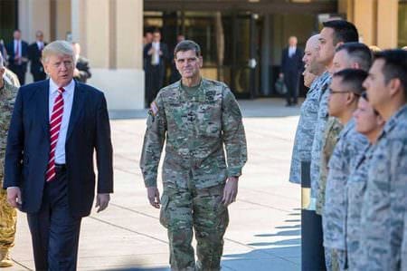 President Donald J. Trump and Army Gen. Joseph L. Votel, commander of U.S. Central Command, spend a few minutes with troops on their way to today's press briefing at MacDill Air Force Base, Fla., Feb. 6, 2017. President Trump visited Centcom headquarters to discuss issues relevant to the command’s area of responsibility. U.S. Central Command photo by Marine Corps Sgt. Alan Belser