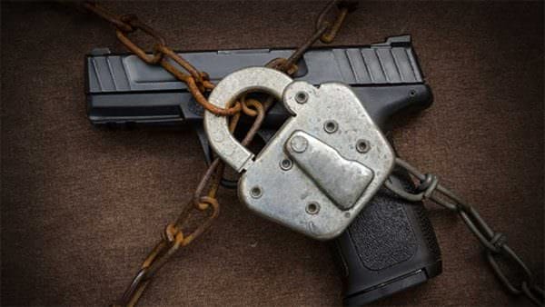 Locked Chained Gun Firearms Ban