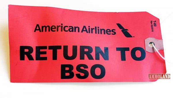 American Airlines Firearms Red Tag saying “Return To Baggage Office"