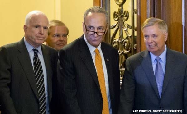 The Senate Axis of evil: Sen. Chuck Schumer, D-N.Y., center, flanked by Sen. John McCain, R-Ariz., left, and Sen. Lindsey Graham, R-S.C.