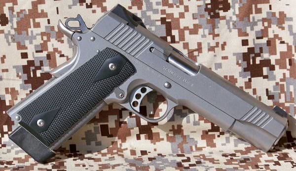 Modern 1911 handgun with a matt cerakote stainless Gun Finishes.