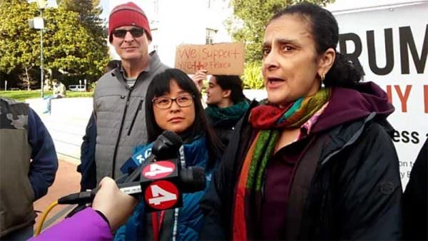 Yvette Felarca (r) and Shanta Driver of BAMN carrying water for Antifa.