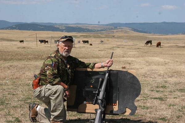 Shooting the Winchester XPR Rifle: Down range 100 yards 20 mph cross wind shooting 142 Grain Win Expedition Long Range. [Cattle came after.]