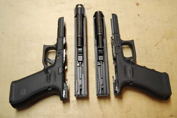 Above is a view of the Glock 17 Gen 5 next to a Glock 34 Gen 4. The order in the picture is a bit mixed up, but this is how it goes: 17 frame, 34 slide, 17 slide, and 34 frame.