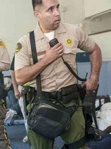 Officer using the Lochspyr Shoulder Bags responding to a mass casualty training simulation.