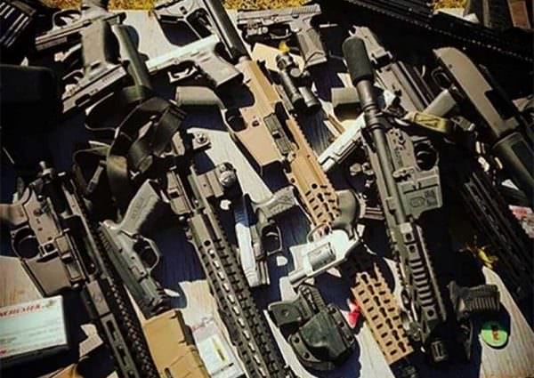 Pile of Guns Firearms Stack Bench