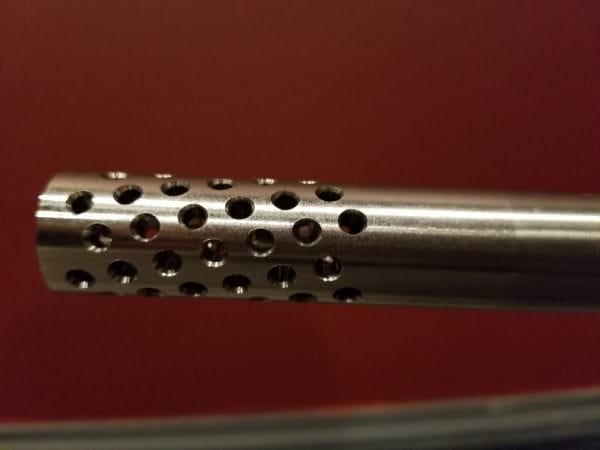 Radical Firearms 6.5 Grendel rifle's muzzle brake on a match grade stainless steel barrel with a 1:9 twist.