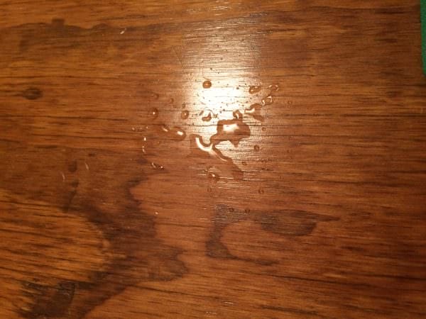 Water, oil, etc. wipe right off of this sealed bench top