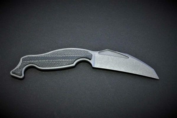 Available in either titanium or stainless steel, with inlays of either carbon fiber or G10.