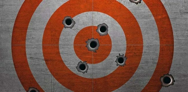 Target With Bullet Holes istock