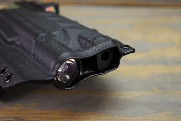 The Roland Special holster is molded to accept a Surefire X300U-A and a compensator as called for in the build sheet. The edges are nicely rolled and finished to feel like the two halves on the holster are one piece that has been split open to accept a gun.