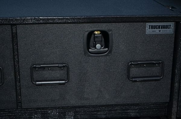 TruckVault - Essentially it is a safe that is installed in the cargo area of your vehicle. 