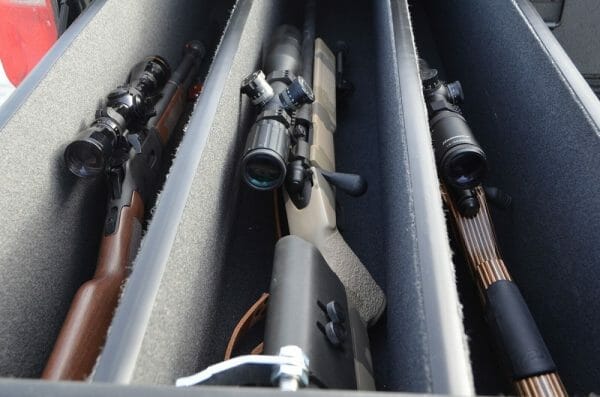 We configured one drawer to hold long guns with two dividers that run the entire length and the magnum height we can load three scoped and pistol gripped rifles on that side. The only one that would not fit standing up was our Savage 110BA in 338 Lapua.