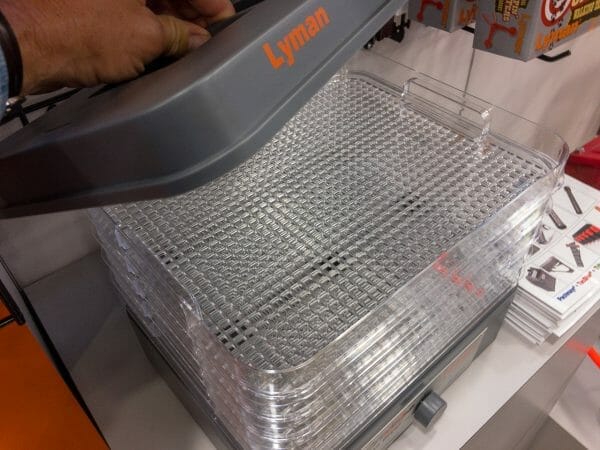 The difference between the Lyman Cyclone and those food dehydrators is significant. It's designed to hold brass cases without them falling through.