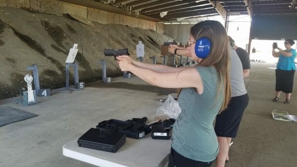  I broke out my Smith & Wesson M&P 22c. I picked the most anti-gun person there that was dragged by her husband to a gun class. I figured she would be the biggest challenge I would have to convert.