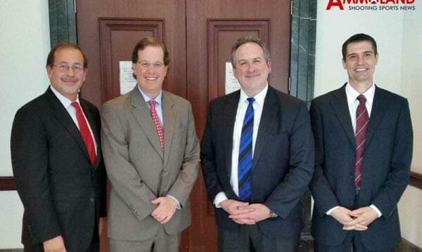 Attorneys Scott Bach, David Thompson, Dan Schmutter and Peter Patterson outside the courtroom at the recent hearing.