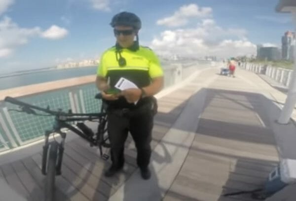 An unidentified Park Ranger told them they had to leave the pier because they were openly carrying