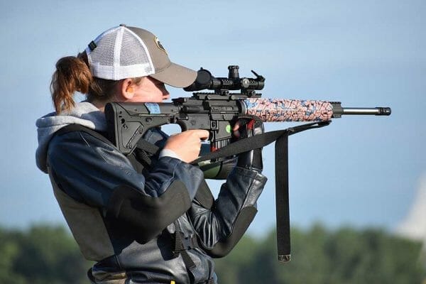 Reilly Sutton of Washington state fires from the standing position during the live fire portion of the clinic.