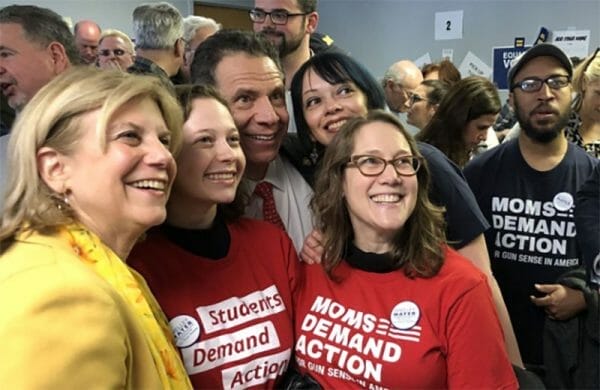 Andrew Cuomo poses with Moms Demand Action Scum